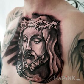 Tattoo Christ in thorns on the chest motif: religious style: graphic / illustrative