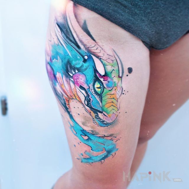 Tattoo Smoczek in colorful motif and Watercolor style on the leg
