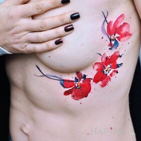Tattoo Poppies three on the ribs motif: flowers style: Watercolor