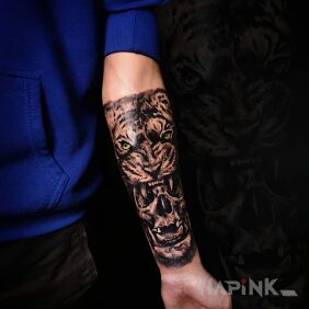 Tattoo Tiger skull on the forearm motif: black and gray style: realistic