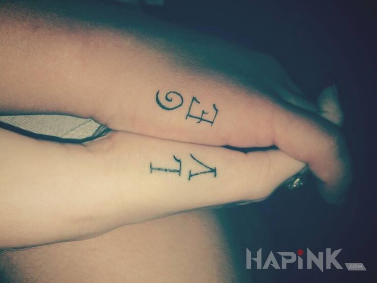 Tattoo Napis in Love motif on the hand