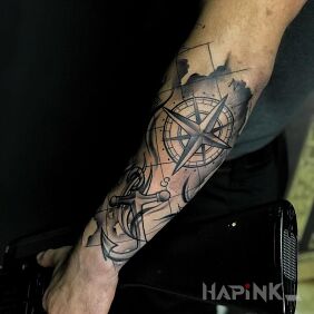 Tattoo Wind rose on the forearm motif: black and gray style: graphic / illustrative