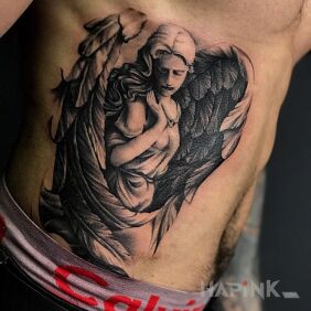 Tattoo Angel on the ribs motif: angels style: realistic