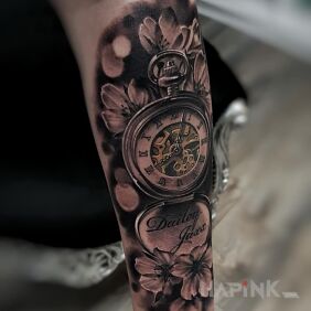 Tattoo Pocket watch on the forearm motif: flowers style: realistic