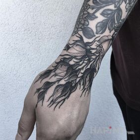 Tattoo Twigs on the hand motif: flowers style: graphic / illustrative