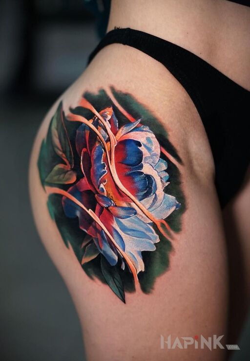 Tattoo Ultrakolorowy kwiat in flowers motif and realistic style on the leg