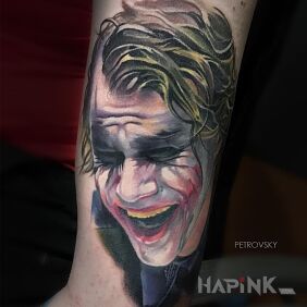 Tattoo Joker's laughter on the upper arm motif: 3D style: realistic