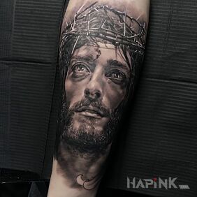 Tattoo Jesus in the crown of thorns on the forearm motif: 3D style: realistic