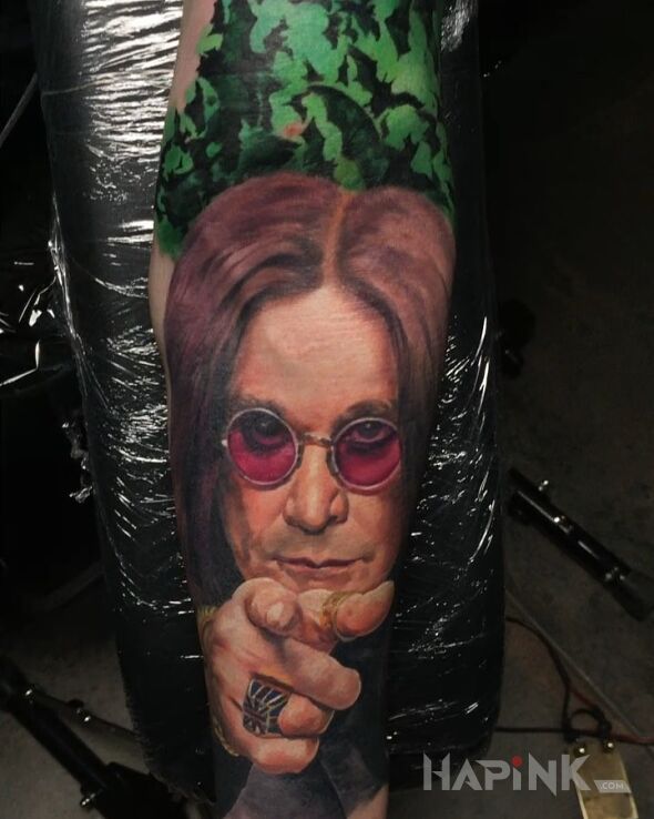 Tattoo Ozzy in 3D motif and realistic style on the forearm