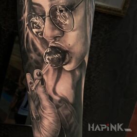 Tattoo Lollipop on the forearm motif: 3D style: realistic