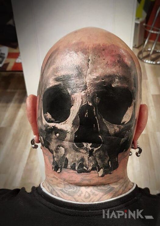 Tattoo Czaszka tam gdzie trzeba in black and gray motif and realistic style on the head