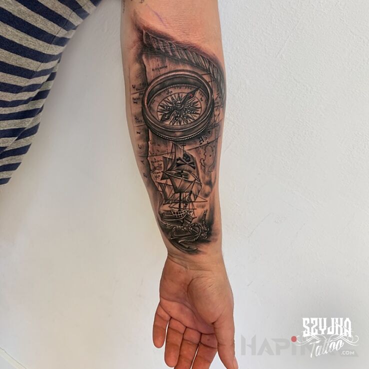 Tattoo Kolejny motyw żeglarski ? in black and gray motif and realistic style on the forearm
