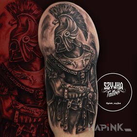 Tattoo Warrior on the upper arm motif: black and gray style: realistic