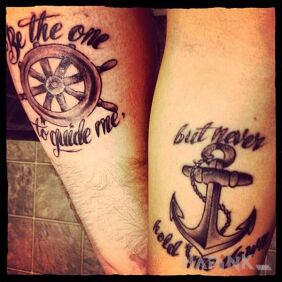 Tattoo Rudder and anchor on the forearm motif: Love