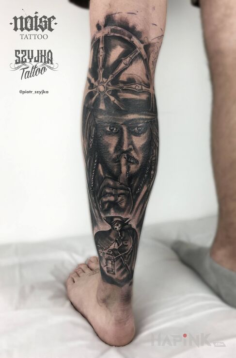 Tattoo Piraci z Karaibów in black and gray motif and realistic style on the calf