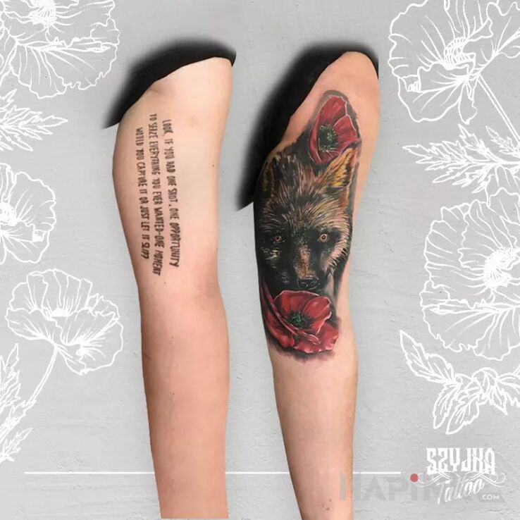 Tattoo Fox in cover-up motif and realistic style on the upper arm
