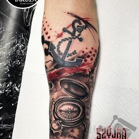 Tattoo Sailing theme ? on the forearm motif: black and gray style: realistic