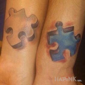 Tattoo Two puzzles on the forearm motif: Love