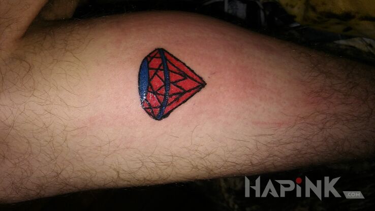 Tattoo Diament in objects motif on the calf