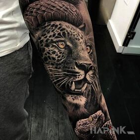 Tattoo Cheetah and snake on the forearm motif: animals style: realistic