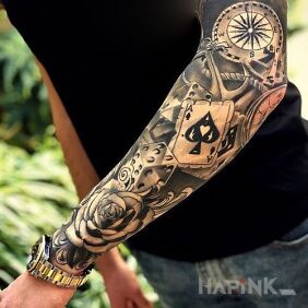 Tattoo Ace of Spades on the forearm motif: black and gray style: graphic / illustrative