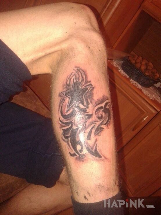 Tattoo Fajna dziara na nogę in tribal style on the leg