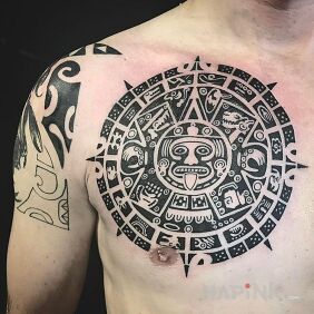Tattoo Aztec calendar on the collarbone motif: black and gray style: Polynesian