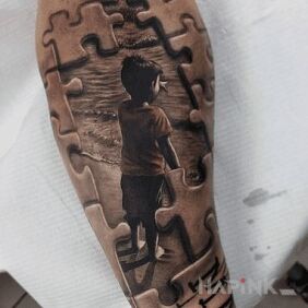 Tattoo Child by the Sea on the forearm motif: black and gray style: realistic