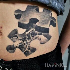 Tattoo Puzzles / Modes on the stomach motif: black and gray style: realistic