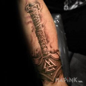 Tattoo Mjolnir on the forearm motif: 3D style: realistic