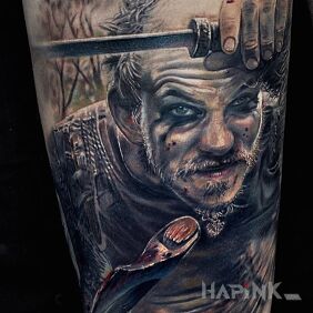 Tattoo Viking Floki on the forearm motif: colorful style: realistic