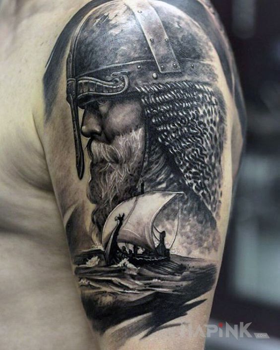 Tattoo Podstarzały wiking in black and gray motif and realistic style on the upper arm