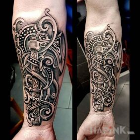 Tattoo Hatchet on the forearm motif: objects style: Celtic / Nordic