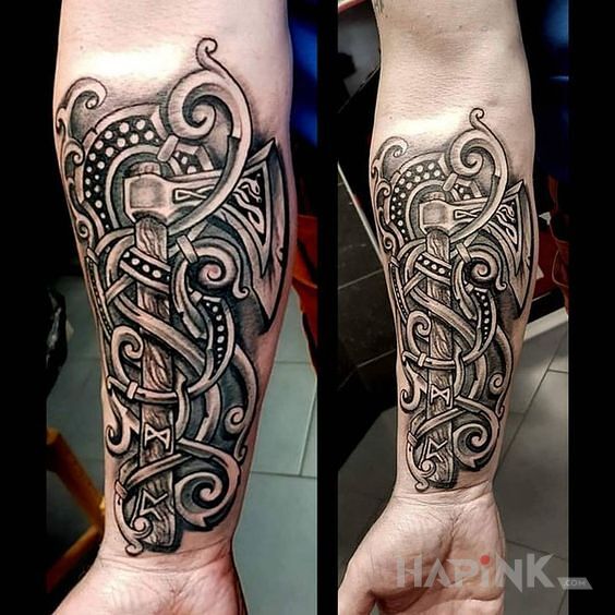 Tattoo Toporek in black and gray motif and Celtic / Nordic style on the forearm