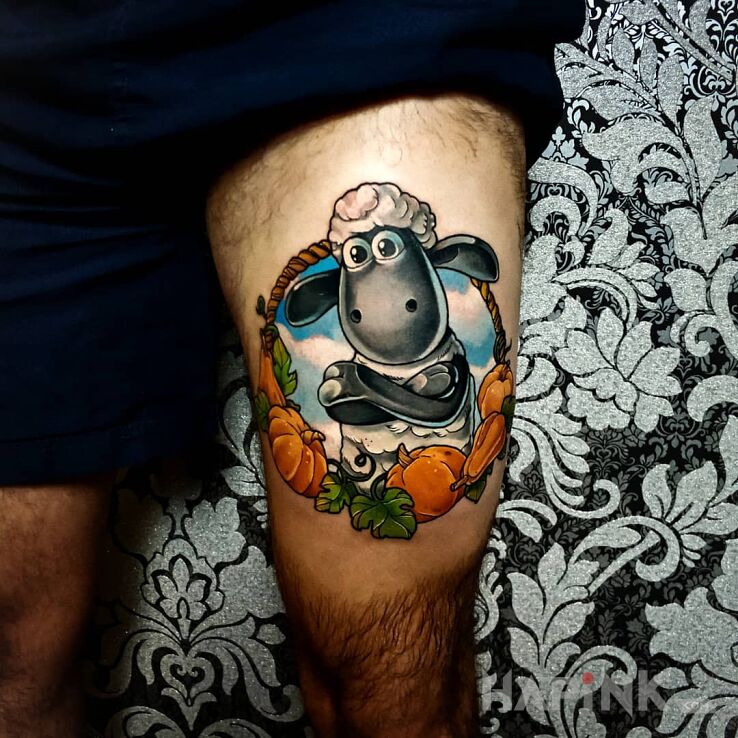 Tattoo Baranek Shaun in colorful motif and cartoon / comic book style on the leg