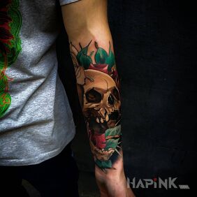 Tattoo The pitted skull on the forearm motif: skulls style: realistic