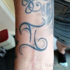 Tattoo Twins on the wrist motif: zodiac signs style: minimalistic
