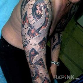 Tattoo Tribal 3D on the upper arm motif: colorful style: tribal