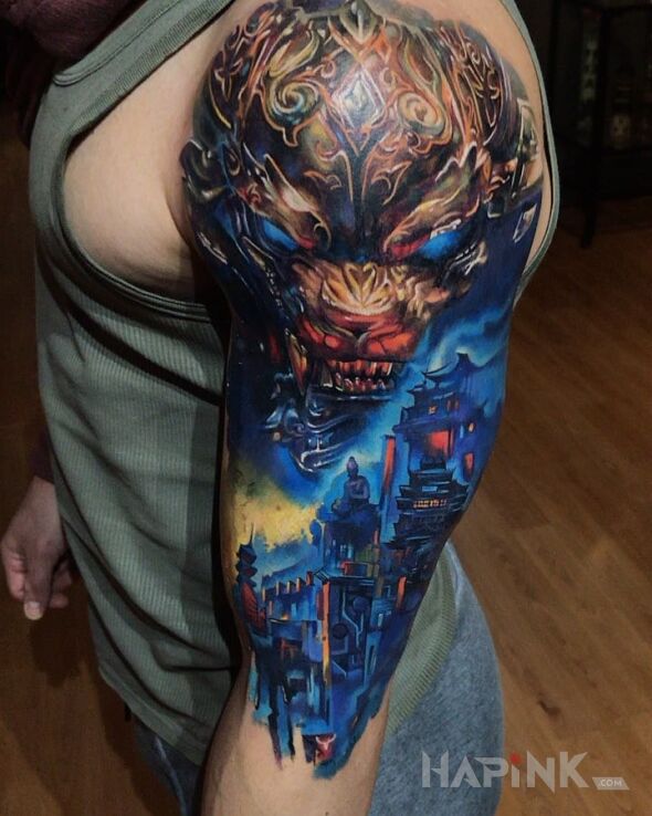 Tattoo Chiński lew in colorful motif and graphic / illustrative style on the upper arm