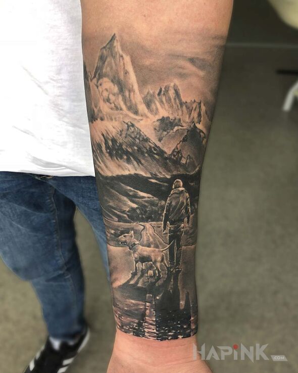 Tattoo Człowiek z psem in black and gray motif and realistic style on the forearm