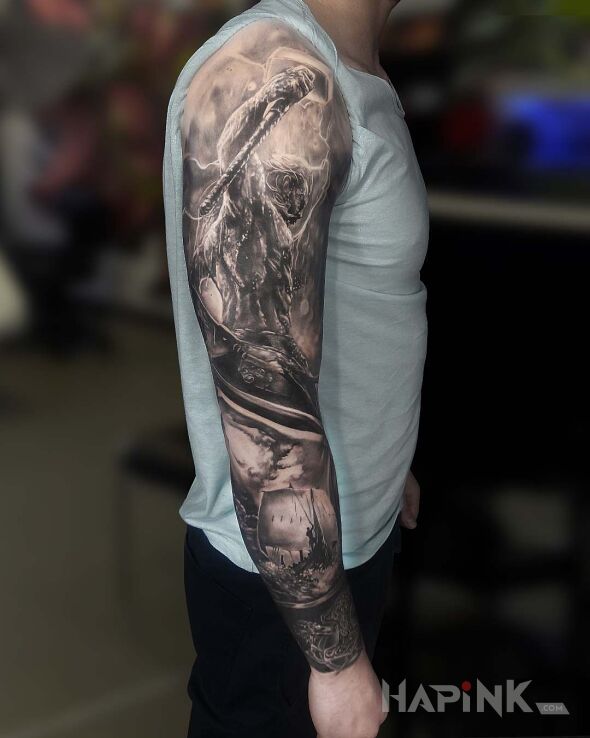 Tattoo Rękaw w wikingowym stylu in sleeves motif and realistic style on the upper arm