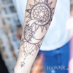 Tattoo The sun and the moon on the forearm motif: ornaments style: graphic / illustrative