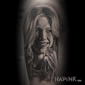 Tattoo Jennifer Aniston on the upper arm motif: faces style: realistic