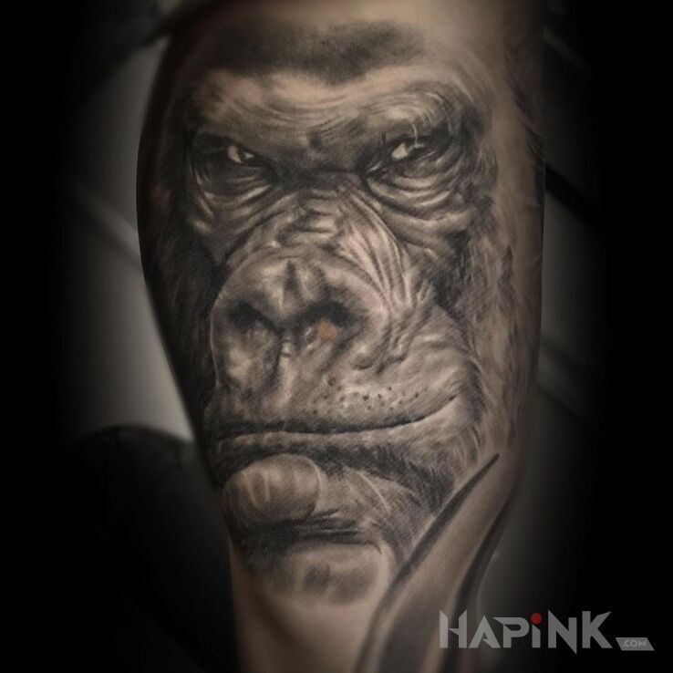 Tattoo Gorilla in animals motif and realistic style on the upper arm