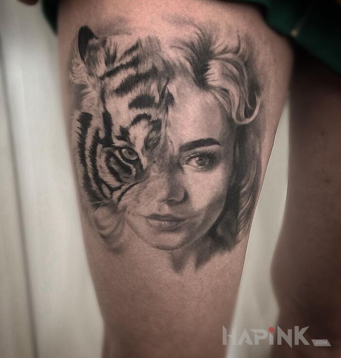 Tattoo Tygrysica :) in animals motif and realistic style on the leg