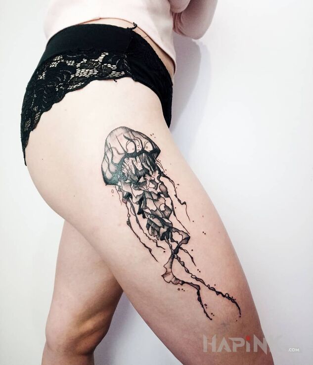 Tattoo Meduza in black and gray motif and graphic / illustrative style on the leg