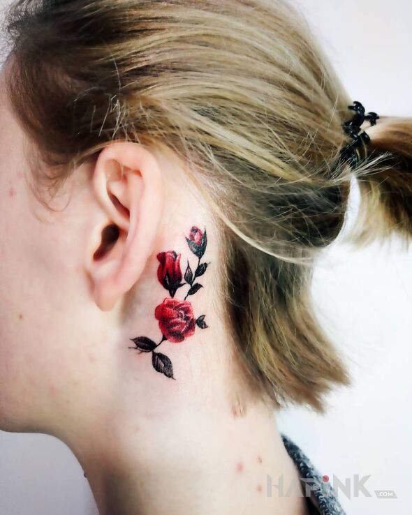 Tattoo Różyczki in flowers motif and realistic style behind the ear