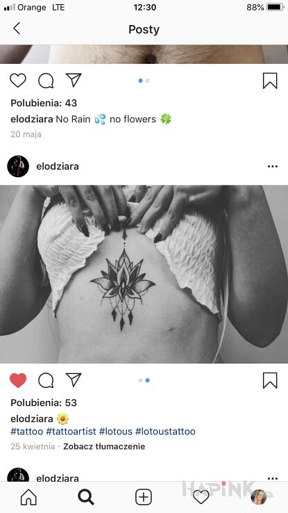 Tattoo Kwiat lotosu in flowers motif and graphic / illustrative style on the stomach