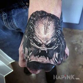 Tattoo Predator's yap on the hand motif: black and gray style: realistic