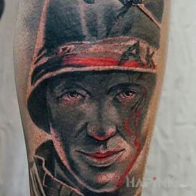 Tattoo AK-PW on the calf motif: war style: realistic